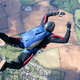 Image for article titled Skydiver With Malfunctioning Parachute Does One Last Scan For Trampoline